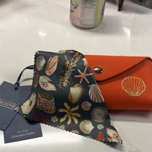 Glasses Case in orange with shell embellishment also beautiful cleaning cloth.